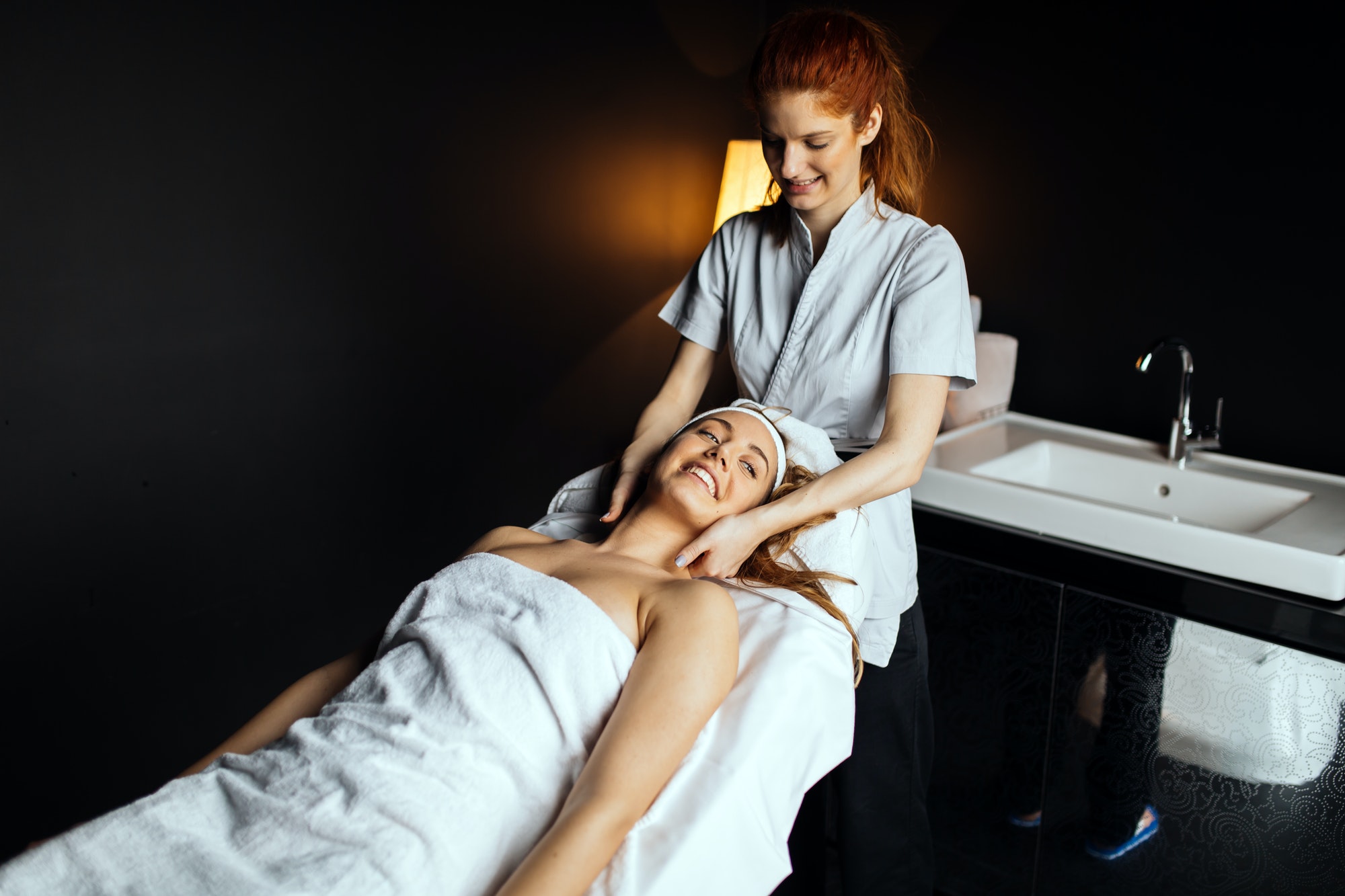 masseur giving treatment